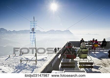 "Mountain inn with a winter landscape and the sun, Wank, Ester Mountains, Upper Bavaria, Bavaria, Germany, Europe" View Large Photo Image Stock Photo - "Mountain inn with a winter landscape and the sun, Wank, Ester Mountains, Upper Bavaria, Bavaria, Germany, Europe". Fotosearch