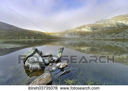 "Mountain lake at Penser Joch Pass, Penser Joch, Sarntal, South Tyrol province, Trentino-Alto Adige, Italy, Europe" View Large Photo Image Stock Photo - "Mountain lake at Penser Joch Pass, Penser Joch, Sarntal, South Tyrol province, Trentino-Alto Adige, Italy, Europe". Fotosearch