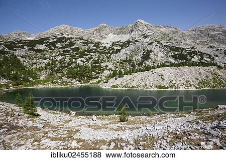 "Mountain lake of Veliko Jezero, Seven Lakes Valley, Triglav National Park, Slovenia, Europe" View Large Photo Image Stock Photo - "Mountain lake of Veliko Jezero, Seven Lakes Valley, Triglav National Park, Slovenia, Europe". Fotosearch