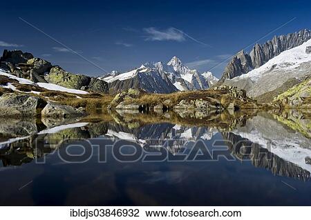 "Mountain lake on Bettmerhorn Mountain, UNESCO World Natural Heritage Site, in front of the peaks of the Bernese Oberland, Bettmeralp, Canton of Valais, Switzerland, Europe" View Large Photo Image Stock Image - "Mountain lake on Bettmerhorn Mountain, UNESCO World Natural Heritage Site, in front of the peaks of the Bernese Oberland, Bettmeralp, Canton of Valais, Switzerland, Europe". Fotosearch