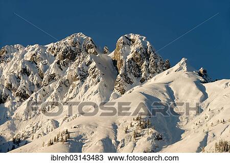 "Mountain landscape, Vomper mountain range in winter, Mt Mittagsspitze and Mt Fiechter Spitze, Karwendel Mountains, Tyrol, Austria, Europe" View Large Photo Image Stock Image - "Mountain landscape, Vomper mountain range in winter, Mt Mittagsspitze and Mt Fiechter Spitze, Karwendel Mountains, Tyrol, Austria, Europe". Fotosearch