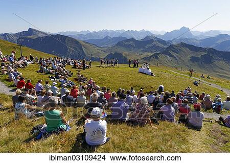 Picture - "Mountain mass during a meeting of alphorn players, Diedamskopf, Schoppernau, Bregenzerwald, Bregenzer Wald, Vorarlberg, Austria, Europe". Fotosearch