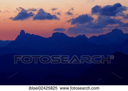 "Mountain panorama in the evening light with clouds in the sky, Warth, Vorarlberg, Austria, Europe" View Large Photo Image Stock Photography - "Mountain panorama in the evening light with clouds in the sky, Warth, Vorarlberg, Austria, Europe". Fotosearch