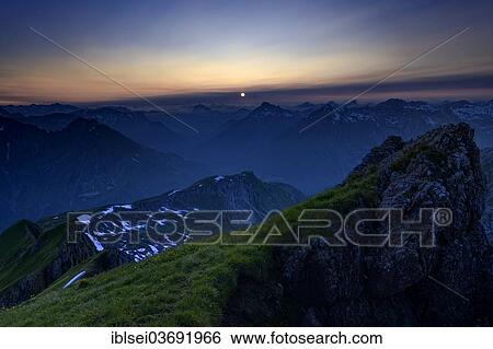 "Mountain pasture at sunset with a panoramic view of the mountains, Lech valley, Kaisers, Reutte District, Tyrol, Austria, Europe" View Large Photo Image Stock Photograph - "Mountain pasture at sunset with a panoramic view of the mountains, Lech valley, Kaisers, Reutte District, Tyrol, Austria, Europe". Fotosearch