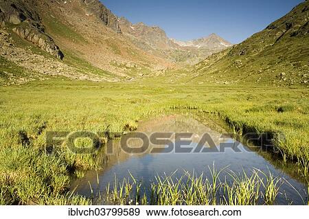 "Mountain range reflected in Tumpen, Kaunertal, North Tyrol, Austria, Europe" View Large Photo Image Stock Photo - "Mountain range reflected in Tumpen, Kaunertal, North Tyrol, Austria, Europe". Fotosearch