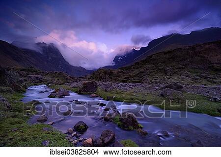 "Mountain stream with the peaks of El Altar or Kapak Urku, at dusk, Riobamba, Region Cotopaxi, Ecuador, South America" View Large Photo Image Picture - "Mountain stream with the peaks of El Altar or Kapak Urku, at dusk, Riobamba, Region Cotopaxi, Ecuador, South America". Fotosearch