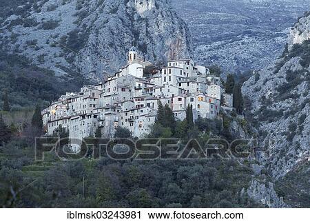 Stock Image - "Mountain village of Peillon, evening mood, Peillon, Departement Alpes-Maritimes, Region Provence-Alpes-Cote dâ€™Azur, France, Europe". Fotosearch