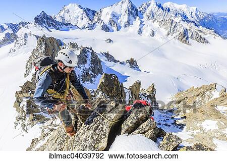 "Mountaineer during the ascent of the southern summit of Aiguille du Tour, Mont Blanc massif, Alps, Canton of Valais, Switzerland, Europe" View Large Photo Image Stock Image - "Mountaineer during the ascent of the southern summit of Aiguille du Tour, Mont Blanc massif, Alps, Canton of Valais, Switzerland, Europe". Fotosearch