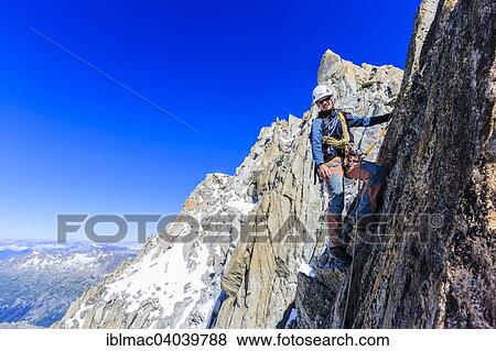 "Mountaineer during the ascent of the southern summit of Aiguille du Tour, Mont Blanc massif, Alps, Canton of Valais, Switzerland, Europe" View Large Photo Image Stock Photo - "Mountaineer during the ascent of the southern summit of Aiguille du Tour, Mont Blanc massif, Alps, Canton of Valais, Switzerland, Europe". Fotosearch