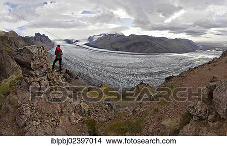 "Mountaineer in front of Vatnajoekull glacier tongue, Skaftafell, South Iceland, Iceland, Europe" View Large Photo Image Picture - "Mountaineer in front of Vatnajoekull glacier tongue, Skaftafell, South Iceland, Iceland, Europe". Fotosearch