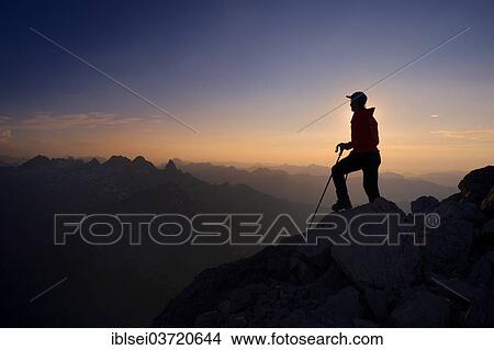 "Mountaineer on Grosser Krottenkopf Mountain at dusk, Allgauer Alpen, Tyrol, Austria, Europe" View Large Photo Image Picture - "Mountaineer on Grosser Krottenkopf Mountain at dusk, Allgauer Alpen, Tyrol, Austria, Europe". Fotosearch