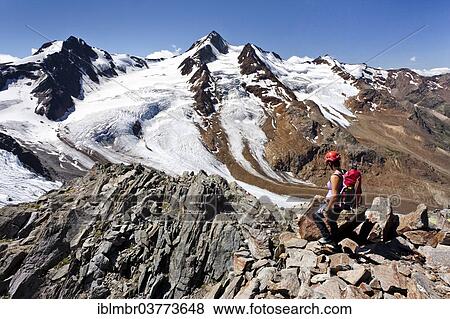 "Mountaineer on the Richterweg trail, mountains Weisskugel and Langtauferer Spitze at back, South Tyrol, Trentino-Alto Adige, Italy, Europe" View Large Photo Image Stock Photo - "Mountaineer on the Richterweg trail, mountains Weisskugel and Langtauferer Spitze at back, South Tyrol, Trentino-Alto Adige, Italy, Europe". Fotosearch