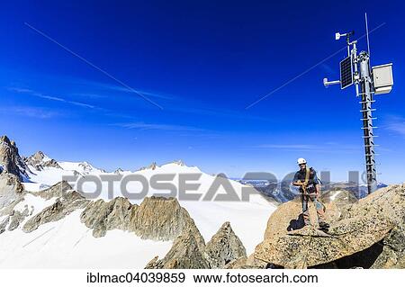 "Mountaineer on the summit of Le Portalet, Mont Blanc massif, Alps, Canton of Valais, Switzerland, Europe" View Large Photo Image Stock Photo - "Mountaineer on the summit of Le Portalet, Mont Blanc massif, Alps, Canton of Valais, Switzerland, Europe". Fotosearch