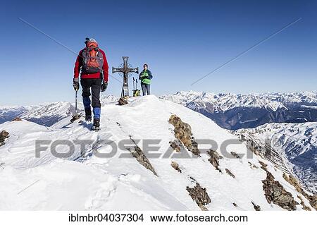 "Mountaineer on the summit of Mt Penser Weisshorn above Penser Joch in Sarn Valley, Sarntal Alps, South Tyrol region of Trentino-Alto Adige, Italy, Europe" View Large Photo Image Picture - "Mountaineer on the summit of Mt Penser Weisshorn above Penser Joch in Sarn Valley, Sarntal Alps, South Tyrol region of Trentino-Alto Adige, Italy, Europe". Fotosearch