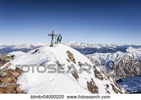 "Mountaineer on the summit of Mt Penser Weisshorn, Sarntal Alps, Sarn Valley, South Tyrol, Trentino-Alto Adige, Italy, Europe" View Large Photo Image Stock Image - "Mountaineer on the summit of Mt Penser Weisshorn, Sarntal Alps, Sarn Valley, South Tyrol, Trentino-Alto Adige, Italy, Europe". Fotosearch