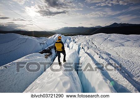 "Mountaineer standing on Matanuska Glacier, Matanuska Glacier, Alaska, United States, North America" View Large Photo Image Stock Image - "Mountaineer standing on Matanuska Glacier, Matanuska Glacier, Alaska, United States, North America". Fotosearch