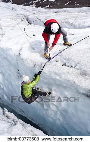 "Mountaineers climbing on Zufallferner Glacier, during a crevasse rescue, South Tyrol, Italy, Europe" View Large Photo Image Stock Photo - "Mountaineers climbing on Zufallferner Glacier, during a crevasse rescue, South Tyrol, Italy, Europe". Fotosearch