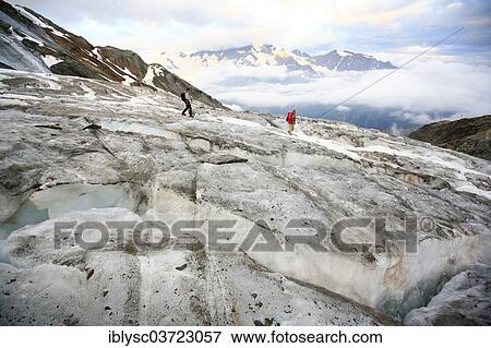 "Mountaineers on Trift Glacier, Canton of Valais, Switzerland, Europe" View Large Photo Image Stock Photo - "Mountaineers on Trift Glacier, Canton of Valais, Switzerland, Europe". Fotosearch