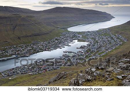"Mountains, fjord in the evening light, port and city, Klaksvik, Borooy, Norooyar, Faroe Islands, Denmark, Europe" View Large Photo Image Picture - "Mountains, fjord in the evening light, port and city, Klaksvik, Borooy, Norooyar, Faroe Islands, Denmark, Europe". Fotosearch
