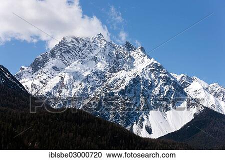 "Mountains of Pisoc Piz, Piz Clemgia and Piz Lavetscha, Sesvenna Group, Sesvenna Range, Cental Eastern Alps, Alps, Scuol, Canton of Graubunden" View Large Photo Image Stock Image - "Mountains of Pisoc Piz, Piz Clemgia and Piz Lavetscha, Sesvenna Group, Sesvenna Range, Cental Eastern Alps, Alps, Scuol, Canton of Graubunden". Fotosearch