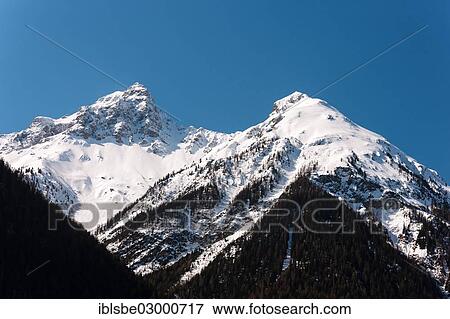 "Mountains of Piz S-chalambert Dadaint and Piz S-chalambert Dadora, Sesvenna Group, Sesvenna Range, Cental Eastern Alps, Alps, Scuol, Canton of Graubunden" View Large Photo Image Stock Photo - "Mountains of Piz S-chalambert Dadaint and Piz S-chalambert Dadora, Sesvenna Group, Sesvenna Range, Cental Eastern Alps, Alps, Scuol, Canton of Graubunden". Fotosearch