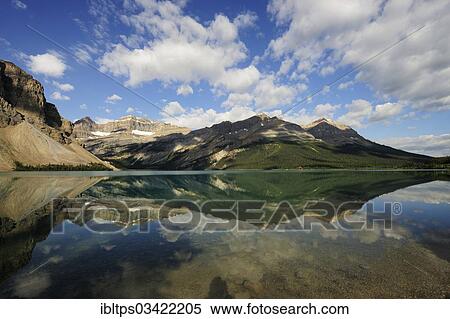Stock Photography - "Mountains of the Rocky Mountains reflected in a lake, Jasper National Park, Alberta Province, Canada, North America". Fotosearch