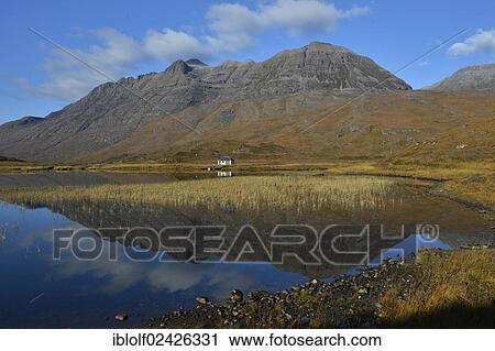 "Mountains reflected in a lake in the Highlands in front of Liathach hill, Glen Torridon, Beinn Eighe National Nature Reserve, SNH, Kinlochewe, Wester Ross, Scotland, United Kingdom, Europe" View Large Photo Image Stock Image - "Mountains reflected in a lake in the Highlands in front of Liathach hill, Glen Torridon, Beinn Eighe National Nature Reserve, SNH, Kinlochewe, Wester Ross, Scotland, United Kingdom, Europe". Fotosearch