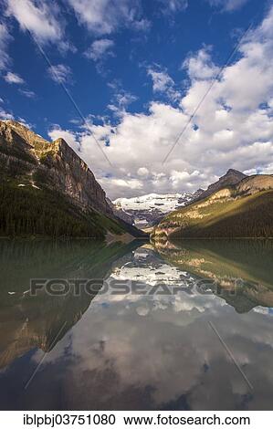 Stock Image - "Mountains reflected in Lake Louise, Banff National Park, Canada, North America". Fotosearch
