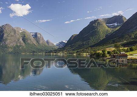 "Mountains reflected in the Oppstrynsvatn Lake, Jostedalsbreen glacier at back, stryn, See Oppstrynsvatn, Sogn og Fjordane, Western Norway, Norway, Europe" View Large Photo Image Stock Image - "Mountains reflected in the Oppstrynsvatn Lake, Jostedalsbreen glacier at back, stryn, See Oppstrynsvatn, Sogn og Fjordane, Western Norway, Norway, Europe". Fotosearch