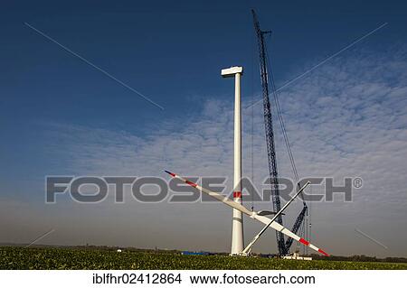 Mounting the rotor on a new wind turbine, Grevenbroich, North Rhine-Westphalia, Germany, Europe View Large Photo Image Picture - Mounting the rotor on a new wind turbine, Grevenbroich, North Rhine-Westphalia, Germany, Europe. Fotosearch