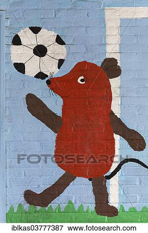 "Mouse figure playing football, mural in a school playground, Germany, Europe" View Large Photo Image Stock Photo - "Mouse figure playing football, mural in a school playground, Germany, Europe". Fotosearch