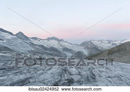 Mt Grossvenediger, dawn at the Obersulzbachkees Glacier, near Neukirchen am Grossvenediger, Venediger Group, Hohe Tauern or High Tauern Range, Alps, State of Salzburg, Austria, Europe View Large Photo Image Stock Image - Mt Grossvenediger, dawn at the Obersulzbachkees Glacier, near Neukirchen am Grossvenediger, Venediger Group, Hohe Tauern or High Tauern Range, Alps, State of Salzburg, Austria, Europe. Fotosearch