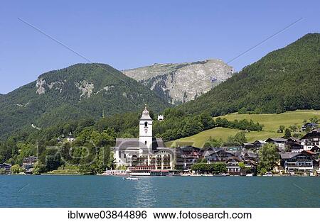 Stock Photograph - "Mt Schafberg, Hotel Weisses Rossel and the pilgrimage church, Wolfgangsee Lake, St. Wolfgang, Salzkammergut, Upper Austria, Austria, Europe". Fotosearch