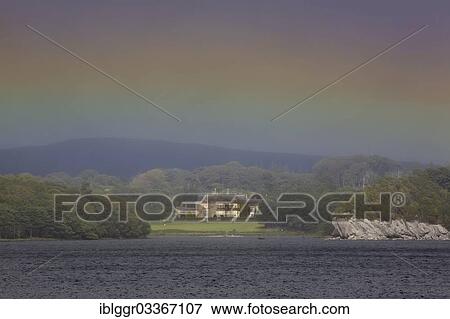 "Muckross House on Muckross Lake with rainbow colors in the sky, Killarney, County Kerry, Ireland, Europe" View Large Photo Image Stock Photo - "Muckross House on Muckross Lake with rainbow colors in the sky, Killarney, County Kerry, Ireland, Europe". Fotosearch