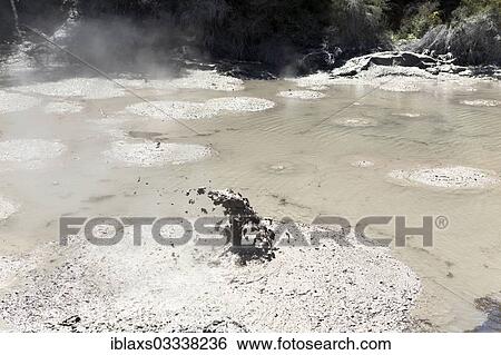Stock Photograph - "Mud pool with an eruption, Waiotapu, Bay of Plenty Region, New Zealand, Oceania". Fotosearch