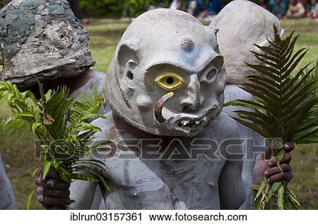 "Mudman celebrating at the traditional Sing Sing gathering in the highlands, Paya, Papua New Guinea, Oceania" View Large Photo Image Stock Image - "Mudman celebrating at the traditional Sing Sing gathering in the highlands, Paya, Papua New Guinea, Oceania". Fotosearch