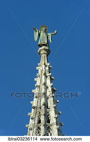 "Muenchner Kindl, statue by Anton Schmid, on top of the spire of the town hall, New Town Hall, Marienplatz, Munich, Upper Bavaria, Bavaria, Germany, Europe" View Large Photo Image Picture - "Muenchner Kindl, statue by Anton Schmid, on top of the spire of the town hall, New Town Hall, Marienplatz, Munich, Upper Bavaria, Bavaria, Germany, Europe". Fotosearch