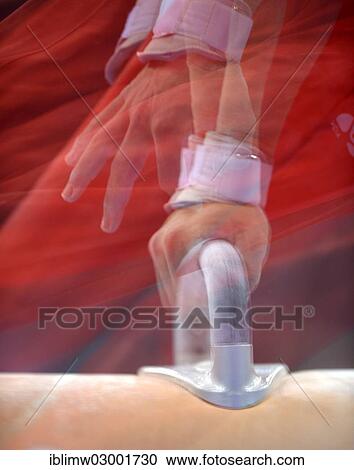 Stock Image - "Multiple exposure, pommel horse, EnBW Gymnastics World Cup 2012, Porsche-Arena, Stuttgart, Baden-Wurttemberg, Germany, Europe". Fotosearch