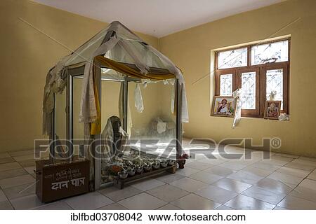 Stock Image - "Mummy of a monk from 15th century in a glas container at a temple, Giu village, Himachal Pradesh, India, Asia". Fotosearch
