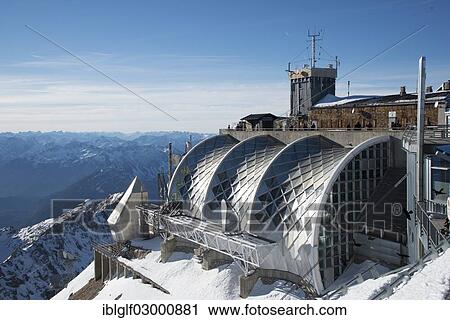 "Munich House on the summit of Mount Zugspitze, Garmisch-Partenkirchen, Grainau, Upper Bavaria, Bavaria, Germany, Europe, Zugspitze, Wetterstein mountain range, Eastern Alps, Grainau, Upper Bavaria, Bavaria, Germany, Europe" View Large Photo Image Stock Image - "Munich House on the summit of Mount Zugspitze, Garmisch-Partenkirchen, Grainau, Upper Bavaria, Bavaria, Germany, Europe, Zugspitze, Wetterstein mountain range, Eastern Alps, Grainau, Upper Bavaria, Bavaria, Germany, Europe". Fotosearch