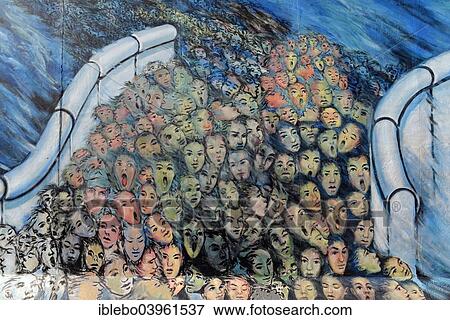 Stock Photo - "Mural, a crowd breaks through the Berlin Wall, Berlin Wall, East Side Gallery, Berlin, Germany, Europe". Fotosearch