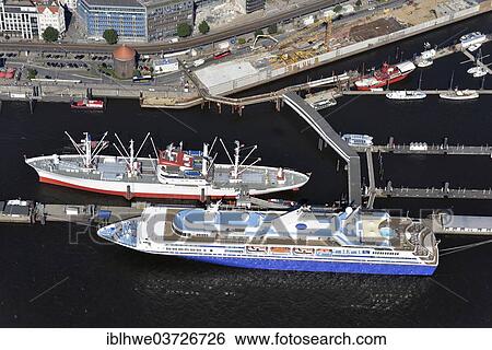 "Museum ship """"MS Cap San Diego"""" with the cruise ship """"MV Explorer"""" at Ueberseebruecke pier, aerial view, Hamburg, Hamburg, Germany, Europe" View Large Photo Image Stock Photograph - "Museum ship """"MS Cap San Diego"""" with the cruise ship """"MV Explorer"""" at Ueberseebruecke pier, aerial view, Hamburg, Hamburg, Germany, Europe". Fotosearch