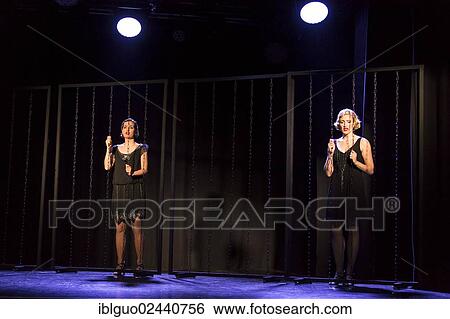 "Musical """"Chicago"""" with Annette Krossa as Roxie Hart and Natascha-Cecillia Hill as Velma Kelly, live performance, Le Theatre in Kriens, Lucerne, Switzerland, Europe" View Large Photo Image Stock Photograph - "Musical """"Chicago"""" with Annette Krossa as Roxie Hart and Natascha-Cecillia Hill as Velma Kelly, live performance, Le Theatre in Kriens, Lucerne, Switzerland, Europe". Fotosearch
