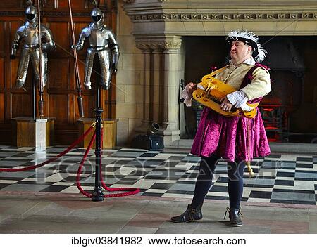 "Musician in period costume performing on a medieval hurdy-gurdy, Edinburgh Castle, Edinburgh, Scotland, United Kingdom, Europe" View Large Photo Image Stock Image - "Musician in period costume performing on a medieval hurdy-gurdy, Edinburgh Castle, Edinburgh, Scotland, United Kingdom, Europe". Fotosearch