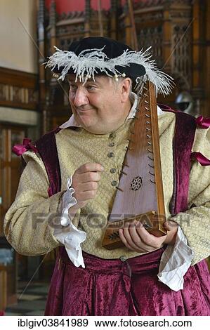 "Musician in period costume performing on a medieval psaltery, Edinburgh Castle, Edinburgh, Scotland, United Kingdom, Europe" View Large Photo Image Stock Photo - "Musician in period costume performing on a medieval psaltery, Edinburgh Castle, Edinburgh, Scotland, United Kingdom, Europe". Fotosearch