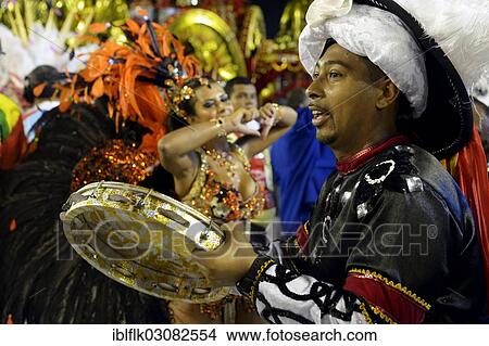 "Musician of the drum group Bateria with pandeiro, parade of the samba school Inocentes de Belford Rocho, Sambodromo, Rio de Janeiro, Brazil, South America" View Large Photo Image Picture - "Musician of the drum group Bateria with pandeiro, parade of the samba school Inocentes de Belford Rocho, Sambodromo, Rio de Janeiro, Brazil, South America". Fotosearch