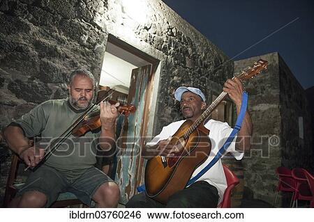 "Musicians in front of a tavern, Fogo island, Cape Verde, Africa" View Large Photo Image Stock Photograph - "Musicians in front of a tavern, Fogo island, Cape Verde, Africa". Fotosearch