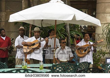 "Musicians playing at a restaurant, Havana, Cuba, North America" View Large Photo Image Stock Photograph - "Musicians playing at a restaurant, Havana, Cuba, North America". Fotosearch
