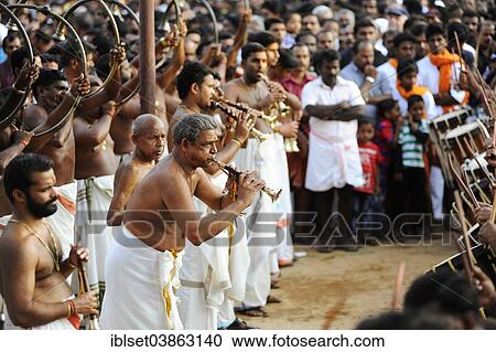 "Musicians with trumpets at Hindu temple festival, Thrissur, Kerala, South India, India, Asia" View Large Photo Image Stock Image - "Musicians with trumpets at Hindu temple festival, Thrissur, Kerala, South India, India, Asia". Fotosearch