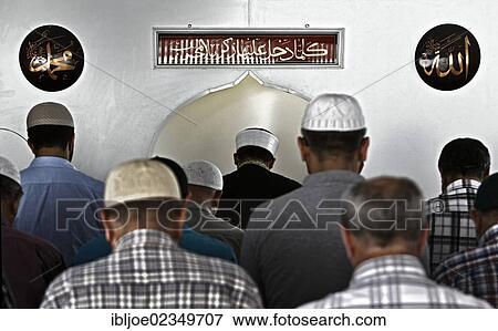 "Muslim men during prayer in the direction of Mecca, Ditip Mosque, Schwaebisch Gmuend, Baden-Wuerttemberg, Germany, Europe" View Large Photo Image Stock Photo - "Muslim men during prayer in the direction of Mecca, Ditip Mosque, Schwaebisch Gmuend, Baden-Wuerttemberg, Germany, Europe". Fotosearch